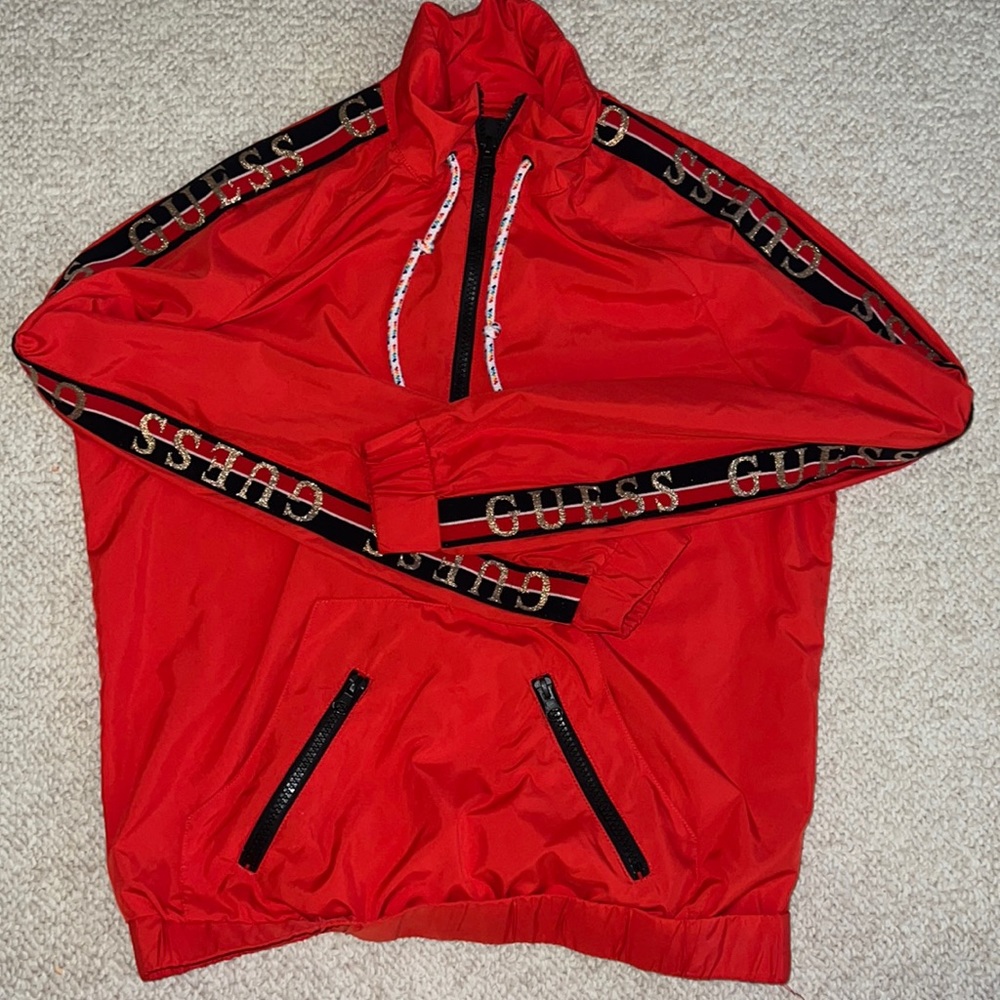 Guess red windbreaker jacket. Size small. Great condition.